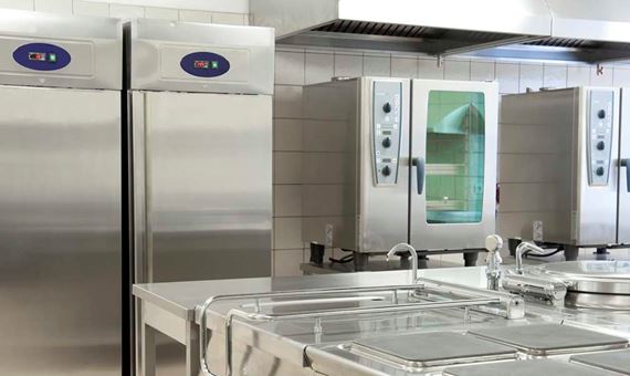 Empty restaurant kitchen with professional equipment