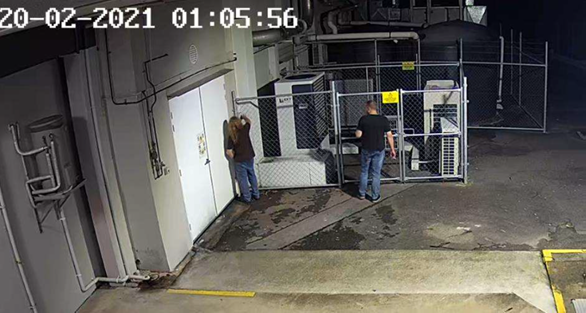 Cropped Still Image From CCTV Depicting Individuals Turning Off Isolator For Chiller